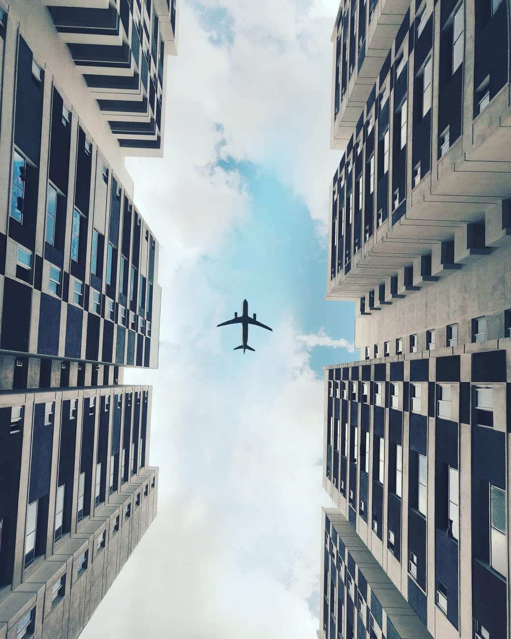 low angle photo of airplane flying
